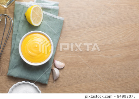 Spanish aioli sauce prepared with garlic, oil and eggs yolk 84992073