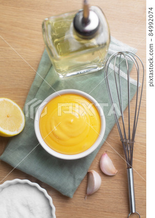 Spanish aioli sauce prepared with garlic, oil and eggs yolk 84992074