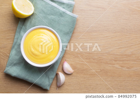 Spanish aioli sauce prepared with garlic, oil and eggs yolk 84992075