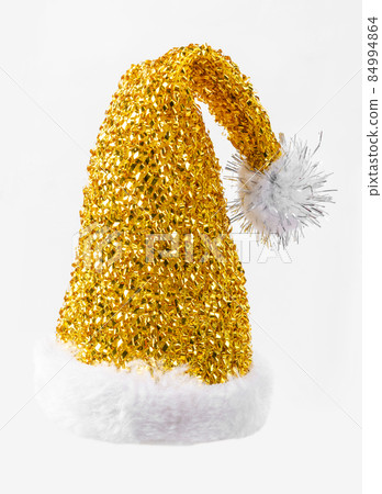 Yellow christmas hat on white background. Yellow christmas hat on white background. 84994864