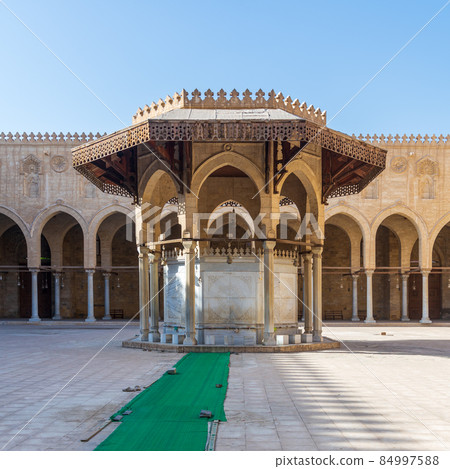 Ablution fountain mediating courtyard of historic mosque of Sultan al Muayyad, and arched corridor, Cairo, Egypt 84997588