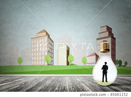 Businessman trapped in bulb Businessman trapped in bulb 85001152