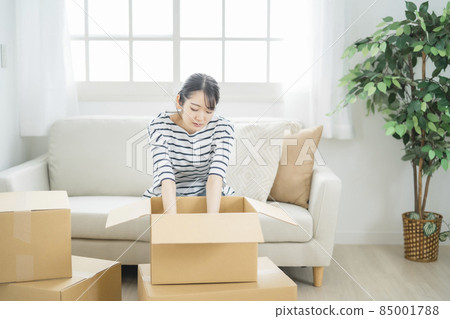 Japanese woman tired of moving work and packing 85001788