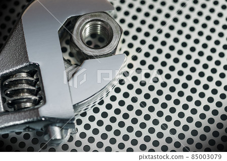 Modern Stainless Steel Adjustable Wrench and a Bolt 85003079