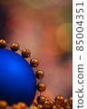 Christmas decoration with blue globe and garland 85004351