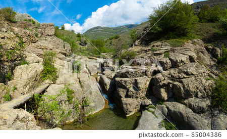 Beautiful sunny valley between the mountains with lush clouds in the Crimea, Ukraine 85004386