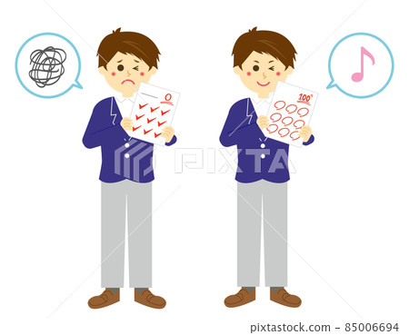 Male student with test answer sheet 85006694