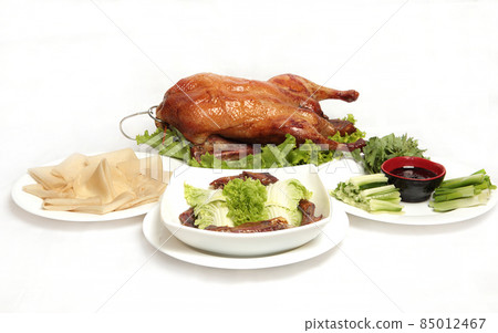 Properly served with Peking duck on white background 85012467
