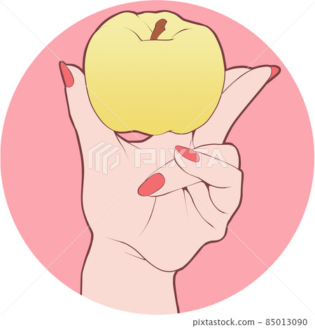 Female hand with a small yellow apple Female hand with a small yellow apple 85013090
