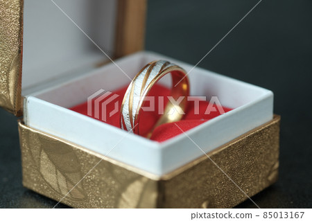 wedding ring in a box on red background , wedding ring in a box on red background , 85013167