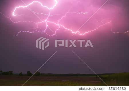 Lightning with with beautiful purple light, thunderstorm at summer 85014280