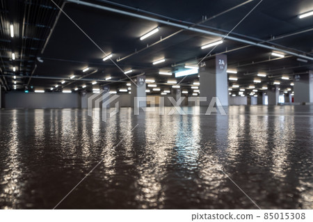 Clean and glossy flooring of the Parking lot in the parking building 85015308