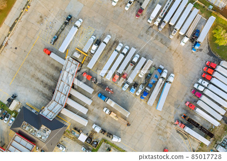 Resting place the truck stop on various types of trucks in a parking lot off the highway Resting place the truck stop on various types of trucks in a parking lot off the highway 85017728