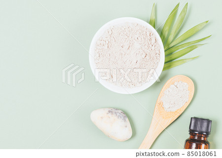 Natural cosmetic clay powder next to essential oil Natural cosmetic clay powder next to essential oil 85018061