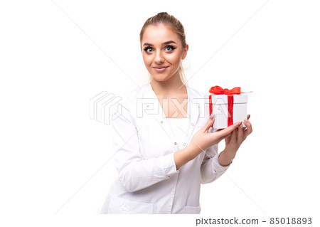 Photo of a beautiful pretty attractive positive smiling young blonde woman with a ponytail and Photo of a beautiful pretty attractive positive smiling young blonde woman with a ponytail and 85018893