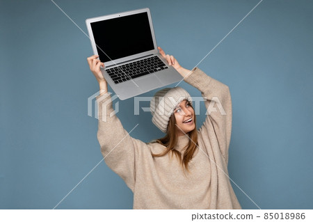 Photo of attractive pretty beautiful positive happy smiling young dark blond woman isolated over Photo of attractive pretty beautiful positive happy smiling young dark blond woman isolated over 85018986