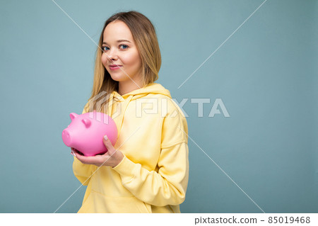 Portrait of happy positive smiling young beautiful winsome blonde woman with sincere emotions Portrait of happy positive smiling young beautiful winsome blonde woman with sincere emotions 85019468