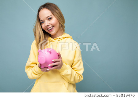 Portrait photo of happy positive smiling young beautiful attractive blonde woman with sincere Portrait photo of happy positive smiling young beautiful attractive blonde woman with sincere 85019470