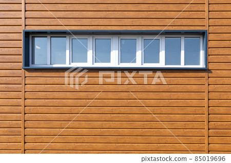 Wooden wall background with small windows. Light wood pattern. Modern wood template. Horizontal 85019696