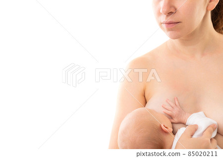 feeding a newborn on a white background with mother's milk 85020211