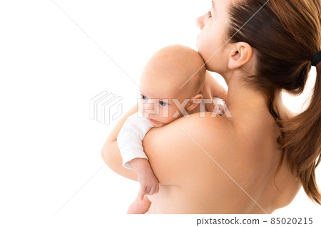 baby on mother's breast on a white background, Concept of caring for the health of a newborn baby 85020215