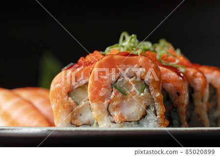 Sushi Rolls Set with Salmon and Cream Cheese and Cucumber on Plate macro Close Up. 85020899