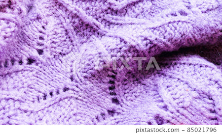Violet knitted surface close up, concept color of the year 2022. 85021796