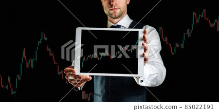 Data analysis. Businessman holding finance application for sell, buy and analysis profit dividend statistics. Investment business technology app on digital screen. Online success background. Data analysis. Businessman holding finance application for sell, buy and analysis profit dividend statistics. Investment business technology app on digital screen. Online success background. 85022191