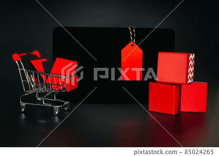 Banner, poster.Black Friday sale concept. Flat lay, top view, overhead.Black Friday shopping sale concept with red ticket Sale tag close up on black background.copy space. black friday concept. Banner, poster.Black Friday sale concept. Flat lay, top view, overhead.Black Friday shopping sale concept with red ticket Sale tag close up on black background.copy space. black friday concept. 85024265