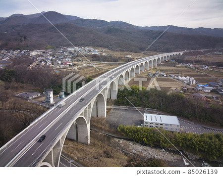 Joshinetsu Expressway Ueda Roman Bridge Ueda City, Nagano Prefecture (aerial view by drone) Joshinetsu Expressway Ueda Roman Bridge Ueda City, Nagano Prefecture (aerial view by drone) 85026139