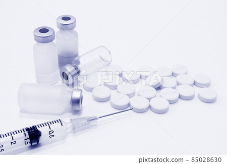 Vials and Ampule of Drugs, 3 ml Plastic Syringe with Needle and Drug Tablets Isolated on the White Background Vials and Ampule of Drugs, 3 ml Plastic Syringe with Needle and Drug Tablets Isolated on the White Background 85028630