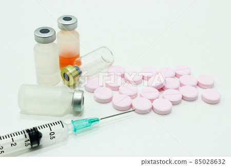 Vials and Ampule of Drugs, 3 ml Plastic Syringe with Needle and Drug Tablets Isolated on the White Background Vials and Ampule of Drugs, 3 ml Plastic Syringe with Needle and Drug Tablets Isolated on the White Background 85028632