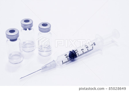 Vial of Drug and 3 ml Plastic Syringe with Needle Isolated on the White Background 85028649