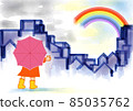 Girl watching the rainbow after the rain 85035762