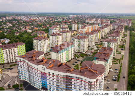 Aerial view of city residential area with high apartment buildings. Aerial view of city residential area with high apartment buildings. 85036413