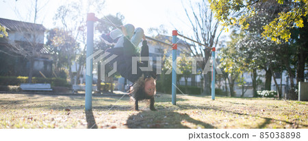 Child practicing upside-down 85038898