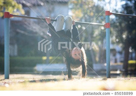 Child practicing upside-down 85038899
