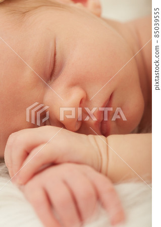 newborn girl sleeping newborn girl sleeping 85039555