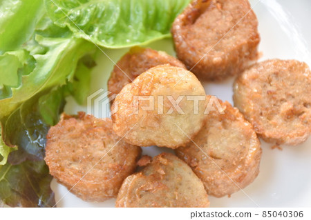 deep fried mashed crab meat and pork roll Chinese food on plate dipping sweet plum sauce 85040306