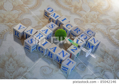 Omicron. Natural wood cubes with blue letters Omicron. Natural wood cubes with blue letters 85042146