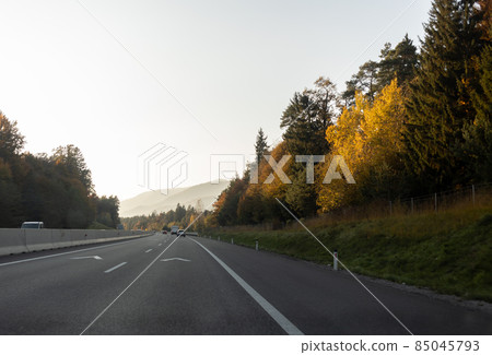 driving on highway first panoramic view on mountains 85045793