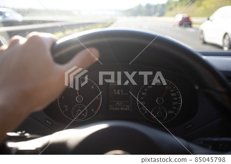 man driving car on highway first person view man driving car on highway first person view 85045798