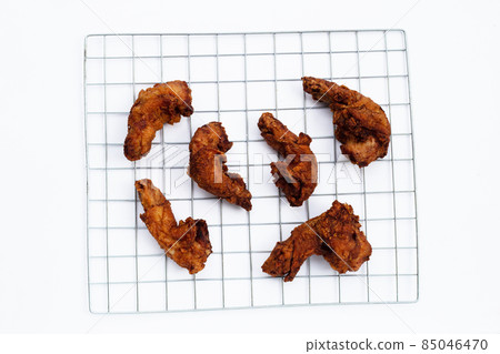 Fried chicken necks on white background. 85046470