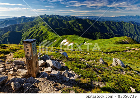 View of the main ridgeline from the Asahi mountain range and the summit of Mt. Itoh View of the main ridgeline from the Asahi mountain range and the summit of Mt. Itoh 85050739
