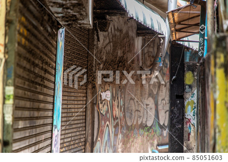 The closed shop in Alley at Khao San Road on daytime without people. COVID-19 outbreak situation The closed shop in Alley at Khao San Road on daytime without people. COVID-19 outbreak situation 85051603
