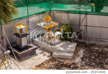Thai spirit house ; shrine of the household god on Construction zone in bangkok. Joss house. Thai spirit house ; shrine of the household god on Construction zone in bangkok. Joss house. 85051606