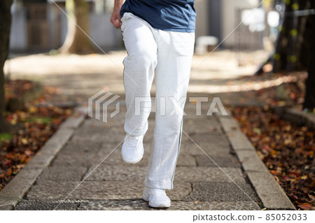 Senior men exercise foot raising 85052033