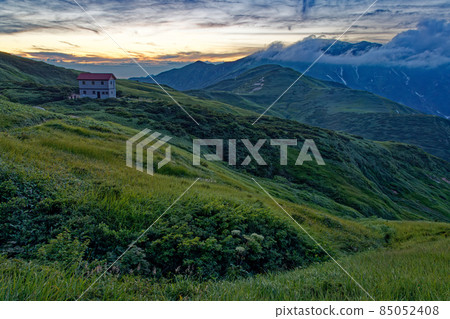 Afterglow Asahi mountain range, Mt. Itoh and fox hole hut Afterglow Asahi mountain range, Mt. Itoh and fox hole hut 85052408