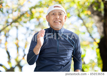 Senior male running outdoors Senior male running outdoors 85053656