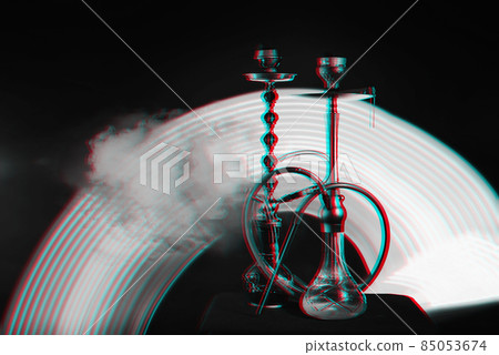 two hookahs with coals in the smoke two hookahs with coals in the smoke 85053674